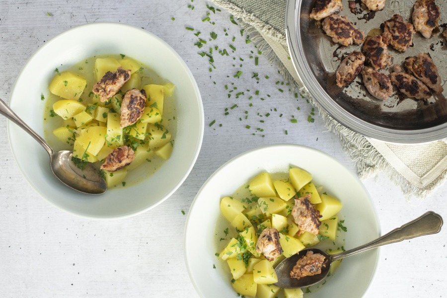 Potato stew with bacon dumplings