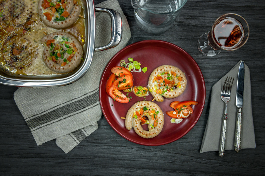 Bratwurst spirals with Gorgonzola topping