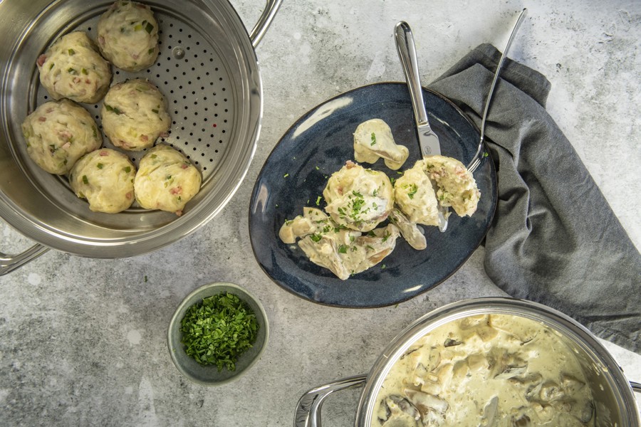 Bacon dumplings with mushroom ragout