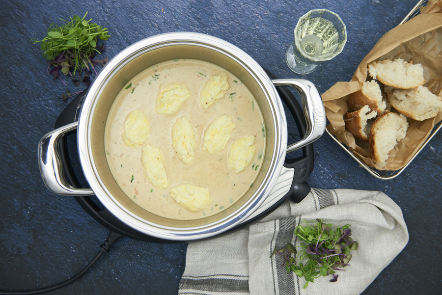 Fish dumplings in white wine sauce