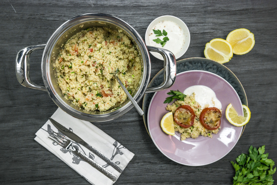 Vegetable couscous with gratinated tomatoes