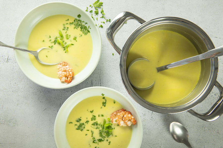 Celery cream soup with shrimp skewers
