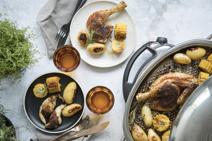 Roast chicken with potatoes and corn